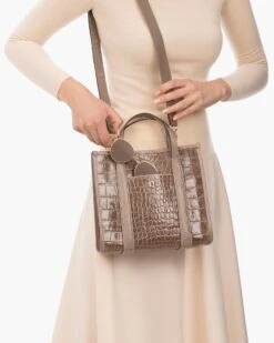 Toto 24 Toto -Ericjavits Shop FW23 23394 TOTO TAUPE SHLDR STP W SNGLS sm 6b6e2852 76f5 40c4 8db0 a8950eedf055